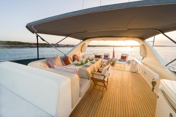Outside-lounge-of-the-luxury-charter-yacht-Canados-80-My-Daypa-cruising-in-Ibiza
